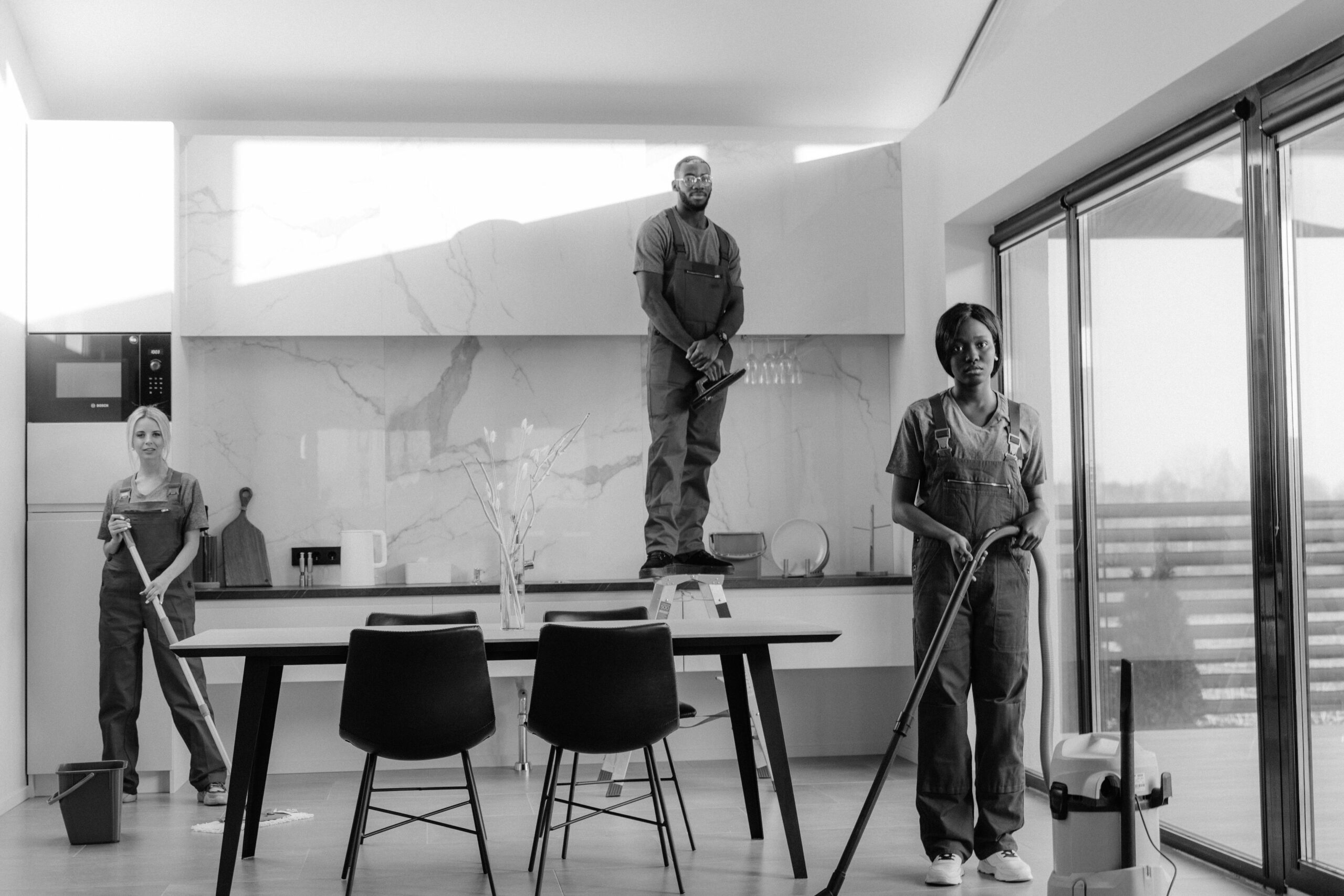 People Cleaning a Dining Room